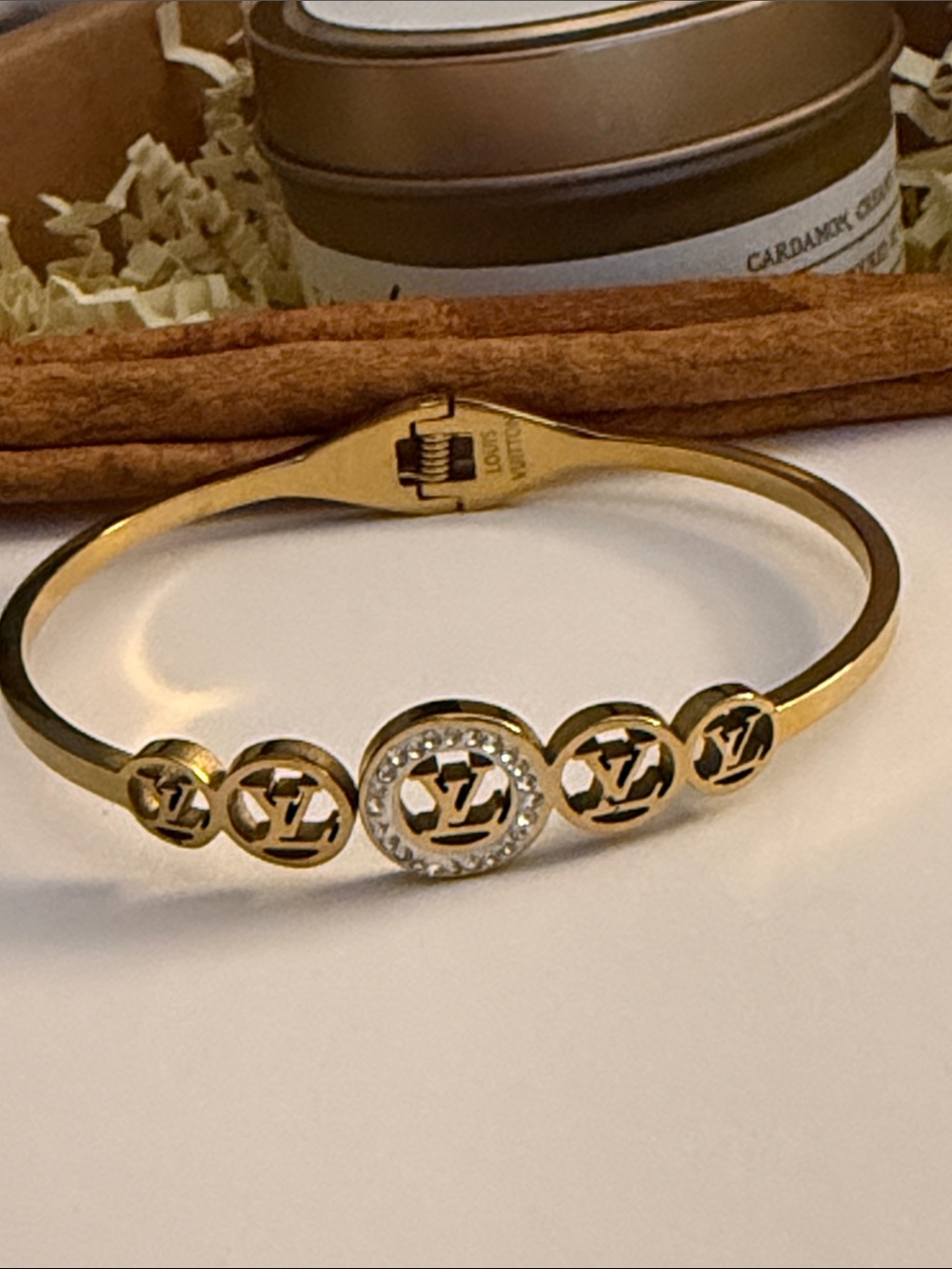 Fashion Jewelry Gold-Tone Logo Circle Bangle with Crystal Accent